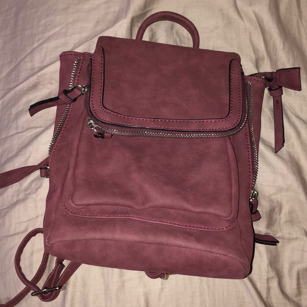 Plum mini back pack purse